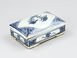 a small blue and white box on a white surface