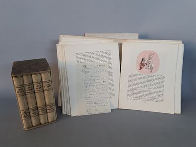 plusieurs livres sont empilés sur une table
