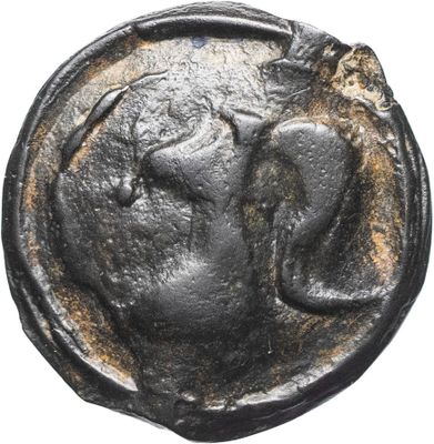 une pièce de monnaie ancienne sur laquelle figure la tête d'un homme