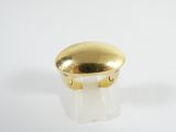 an image of a gold plated ring on a white surface