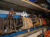 many different types of fire hoses on the shelves