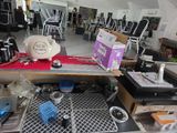 a lot of clutter in a room with many items on the floor