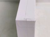 a close up of a piece of white paper on a table