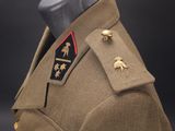 uniform worn by a soldier in the second world war on display in a museum