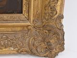 a picture of a picture of a woman in a gold frame