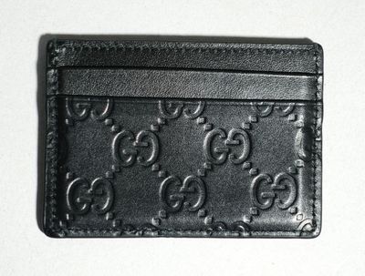 GUCCI Porte carte en cuir noir
