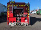 a fire truck that is parked in the parking lot