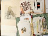 a lot of papers that are on a table