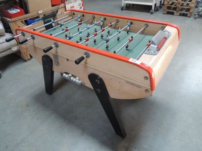 a foosball table in the middle of a room