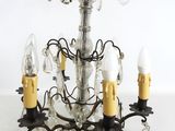 an image of a chandelier with five lights on each of it