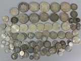 a lot of coins that are on the table