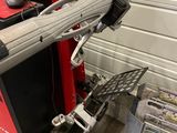 an image of a machine that is working on a piece of metal