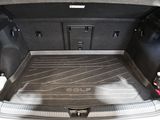 a trunk of a car that has a lot of luggage in it