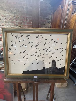 a picture of a picture of birds flying in the sky