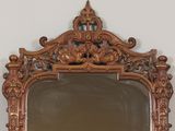 a mirror that is hanging on the wall in the room