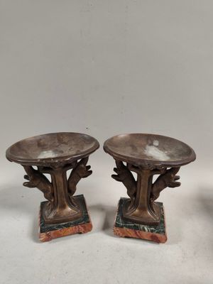 pair of antique bronze candlesticks on marble bases