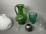 many different vases and vases sitting on a table