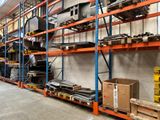 a large warehouse filled with lots of shelves and pallets