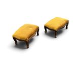 pair of antique foot stools with yellow velvet upholstered seats