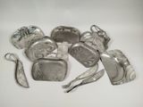 a lot of silver items that are on the table