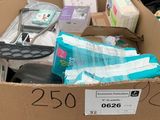 a cardboard box full of toilet paper and other items