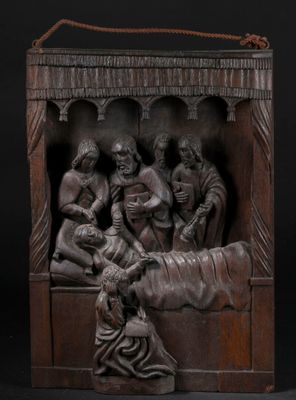 une image représentant une crèche sculptée dans le bois