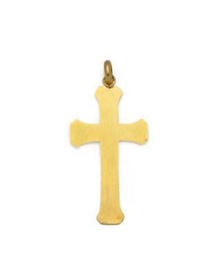 a gold cross pendant on a white background