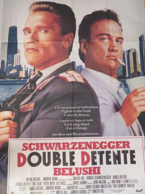 l'affiche du film « Double détenu », mettant en scène deux hommes en costume-cravate