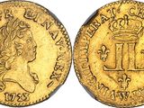 an image of a gold coin with a crown on it
