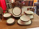 a table with a lot of plates and bowls on it