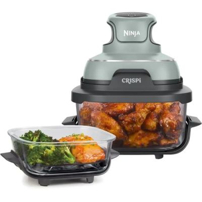 the air fryer has chicken wings and broccoli in it