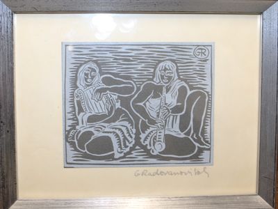 a picture of a picture of two people sitting on a couch