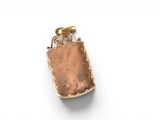 a gold and copper pendant with a rectangular stone on it