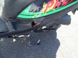 a close up of a motorcycle with a sticker on it