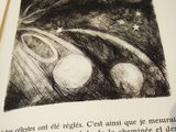 a picture of an open book with a picture of planets on it