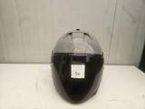 motorcycle helmet sitting on a table with a price tag on it