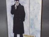the cover of a book with a picture of a man smoking a cigarette