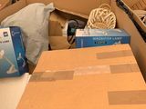 many boxes that are stacked up in a warehouse