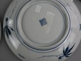 many plates that are sitting on a table