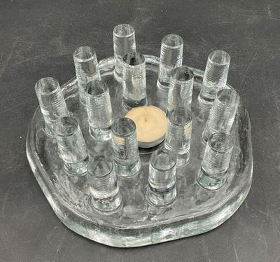 a tray with a lot of shot glasses on it