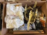 a box full of assorted items sitting on a table