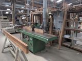 a picture of a workshop with many different types of wood