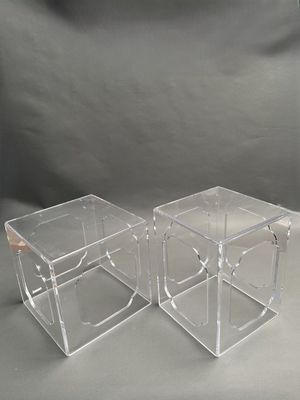 pair of clear acrylic cubes with handles on each side