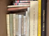 a box full of books that are sitting on a table