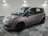 a picture of a small car parked in a garage