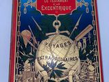 an old book with a picture of a globe surrounded by other objects