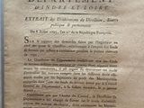 an old document with writing on it sitting on top of a table