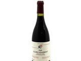 a bottle of wine that is sitting on a table
