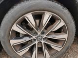 a close up of a tire on a car ' s rim