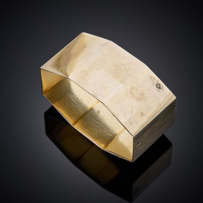 an image of a gold cuff bracelet with a square design